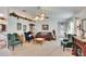 Inviting living room showcases ample seating and a seamless entry to the home's entrance at 3154 Prairie Dunes W Cir, Lakeland, FL 33810