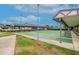 Outdoor shuffleboard courts with covered seating and well-maintained landscaping at 3154 Prairie Dunes W Cir, Lakeland, FL 33810
