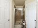 Shower featuring glass door, tile surround, and modern fixtures for a luxurious experience at 3334 Fawnwood Dr, Ocoee, FL 34761