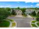 A charming street view featuring well-maintained homes and lush trees under a sunny sky at 3334 Fawnwood Dr, Ocoee, FL 34761