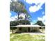 Charming single-story home with a covered porch, offering a cozy and inviting exterior at 4140 Old Dixie Hwy, Auburndale, FL 33823