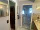 Bathroom view showcasing the tiled floor, vanity, and access to the walk-in closet and separate toilet area at 4805 Oak Acres Dr, Lake Wales, FL 33898