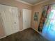 Bedroom featuring a closet, floral curtains, and a relaxing atmosphere at 4805 Oak Acres Dr, Lake Wales, FL 33898