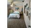 Comfortable bedroom with nautical decorations, soft carpet, and plenty of natural light at 4805 Oak Acres Dr, Lake Wales, FL 33898
