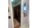 View of the walk-in closet with custom wooden shelving and drawers, offering ample storage space at 4805 Oak Acres Dr, Lake Wales, FL 33898