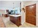 Spacious kitchen featuring a large island, modern appliances, and ample counter space at 4966 Foxrun Ln, Lakeland, FL 33813