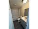 Fresh bathroom with modern vanity, tub/shower combination, and sleek flooring at 5138 Rock Dove Trl, Lakeland, FL 33810
