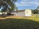 A single-Gathering home, with a large yard surrounded by chain link fence at 5138 Rock Dove Trl, Lakeland, FL 33810