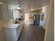 Bright kitchen features white cabinets, stainless steel appliances, and marble countertops at 5138 Rock Dove Trl, Lakeland, FL 33810