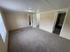 Large main bedroom with neutral walls and carpet with ensuite bathroom at 5138 Rock Dove Trl, Lakeland, FL 33810