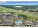 An aerial view showcases a beautiful community, a pool, and easy access to the highway at 519 Sandstone St, Lakeland, FL 33809