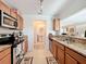Updated kitchen with granite countertops, stainless steel appliances and open floorplan at 519 Sandstone St, Lakeland, FL 33809