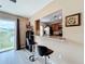 View of kitchen bar with stools and granite countertops at 519 Sandstone St, Lakeland, FL 33809