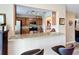 Kitchen with stainless appliances, granite countertops, and bar seating overlooking the living area at 519 Sandstone St, Lakeland, FL 33809