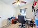 Bright office space with a ceiling fan and black rolling chair at 519 Sandstone St, Lakeland, FL 33809