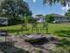 Large backyard with a fire pit and plenty of room, ideal for outdoor entertaining and relaxation at 5427 Orange Valley Dr, Lakeland, FL 33813