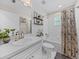 Bathroom featuring a bathtub and shower combination, vanity, and toilet at 5427 Orange Valley Dr, Lakeland, FL 33813