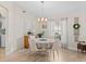 Bright dining area featuring a shiplap wall, modern lighting, and an inviting atmosphere at 5427 Orange Valley Dr, Lakeland, FL 33813
