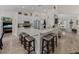Spacious kitchen with island, counter seating and stainless steel appliances at 5427 Orange Valley Dr, Lakeland, FL 33813