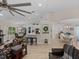 Bright open living space with fireplace, kitchen and dining areas at 5427 Orange Valley Dr, Lakeland, FL 33813