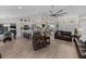 Open concept living space with a kitchen, seating area, and dining area at 5427 Orange Valley Dr, Lakeland, FL 33813