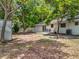 Spacious backyard featuring a concrete patio perfect for outdoor seating and entertaining guests at 603 Solana St, Lakeland, FL 33813