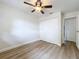 This bedroom features closet space and a ceiling fan at 603 Solana St, Lakeland, FL 33813