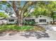 Lovely single Gathering home with lush green lawn and mature trees providing ample shade at 603 Solana St, Lakeland, FL 33813