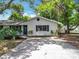Charming single-story home featuring a well-manicured lawn and a welcoming entrance at 603 Solana St, Lakeland, FL 33813