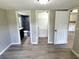 Bedroom with attached bathroom, closet, and doorway leading to the kitchen at 6611 Glen Meadow Loop, Lakeland, FL 33810