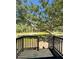 Backyard features large trees for shade and a nice wood deck at 7005 Dove Meadow Trl, Lakeland, FL 33810