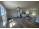 Bright, open floor plan, with modern ceiling fan, and lots of natural light from the large windows at 7005 Dove Meadow Trl, Lakeland, FL 33810