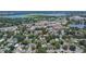 Aerial view of a property nestled among lush trees in a quiet neighborhood close to town at 733 S Clayton Ave, Lakeland, FL 33801