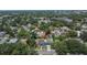 Aerial view of a property nestled among lush trees in a quiet neighborhood at 733 S Clayton Ave, Lakeland, FL 33801