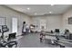 Home gym featuring various exercise equipment, including a treadmill, Pilates machine, and free weights for a full workout at 733 S Clayton Ave, Lakeland, FL 33801