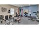 Home gym featuring various exercise equipment, including a treadmill and weight training station at 733 S Clayton Ave, Lakeland, FL 33801