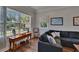 Inviting living room with hardwood floors, natural light, and comfortable seating at 733 S Clayton Ave, Lakeland, FL 33801