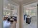 Living room and bathroom showing a modern design with wood floors and great lighting at 733 S Clayton Ave, Lakeland, FL 33801