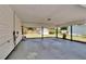 Spacious covered patio with a view of the backyard, perfect for outdoor entertaining and relaxing at 733 S Clayton Ave, Lakeland, FL 33801