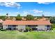 Aerial view of a multifamily home complex in a neighborhood with lush greenery at 804 Magnolia Pl # 804, Winter Haven, FL 33884
