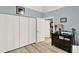 Bedroom with ample closet space and a dark wood dresser with decor at 804 Magnolia Pl # 804, Winter Haven, FL 33884
