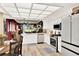 Bright, updated kitchen with stainless appliances and an open view to the living room at 804 Magnolia Pl # 804, Winter Haven, FL 33884
