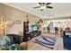 Inviting living room features hardwood floors, modern furniture, and a view of the kitchen at 804 Magnolia Pl # 804, Winter Haven, FL 33884