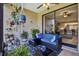 Relax in this cozy patio with comfortable seating and views of the outdoors at 804 Magnolia Pl # 804, Winter Haven, FL 33884