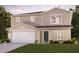 Charming two-story home featuring a two-car garage, well-maintained lawn and traditional design at 3445 Dahlia Dr, Haines City, FL 33844