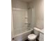 Clean bathroom with shower/tub combo and white fixtures at 2322 Sw 146Th Loop, Ocala, FL 34473