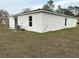 Rear view of a single-story house with AC unit at 2322 Sw 146Th Loop, Ocala, FL 34473