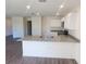 Modern kitchen with granite countertops and stainless steel sink at 13012 Se 53Rd Ave, Belleview, FL 34420