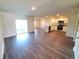 Contemporary kitchen with island, granite countertops, and an open-concept layout at 2408 Nw 22Nd Ct, Ocala, FL 34475