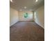 This bedroom features carpeting, three windows and recessed lighting at 5530 Sw 103Rd St Rd, Ocala, FL 34476